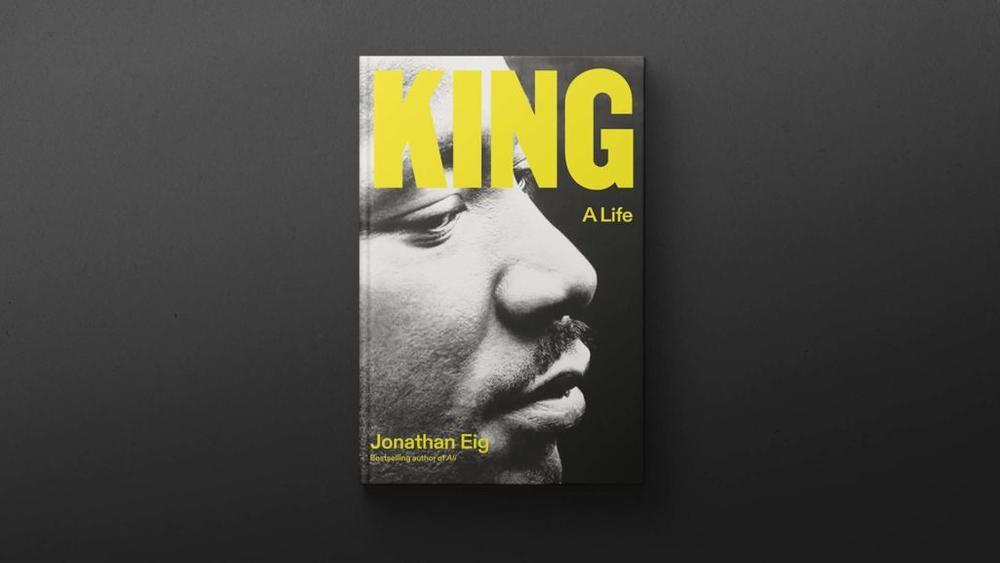 the hardcover biography king: a life on black background